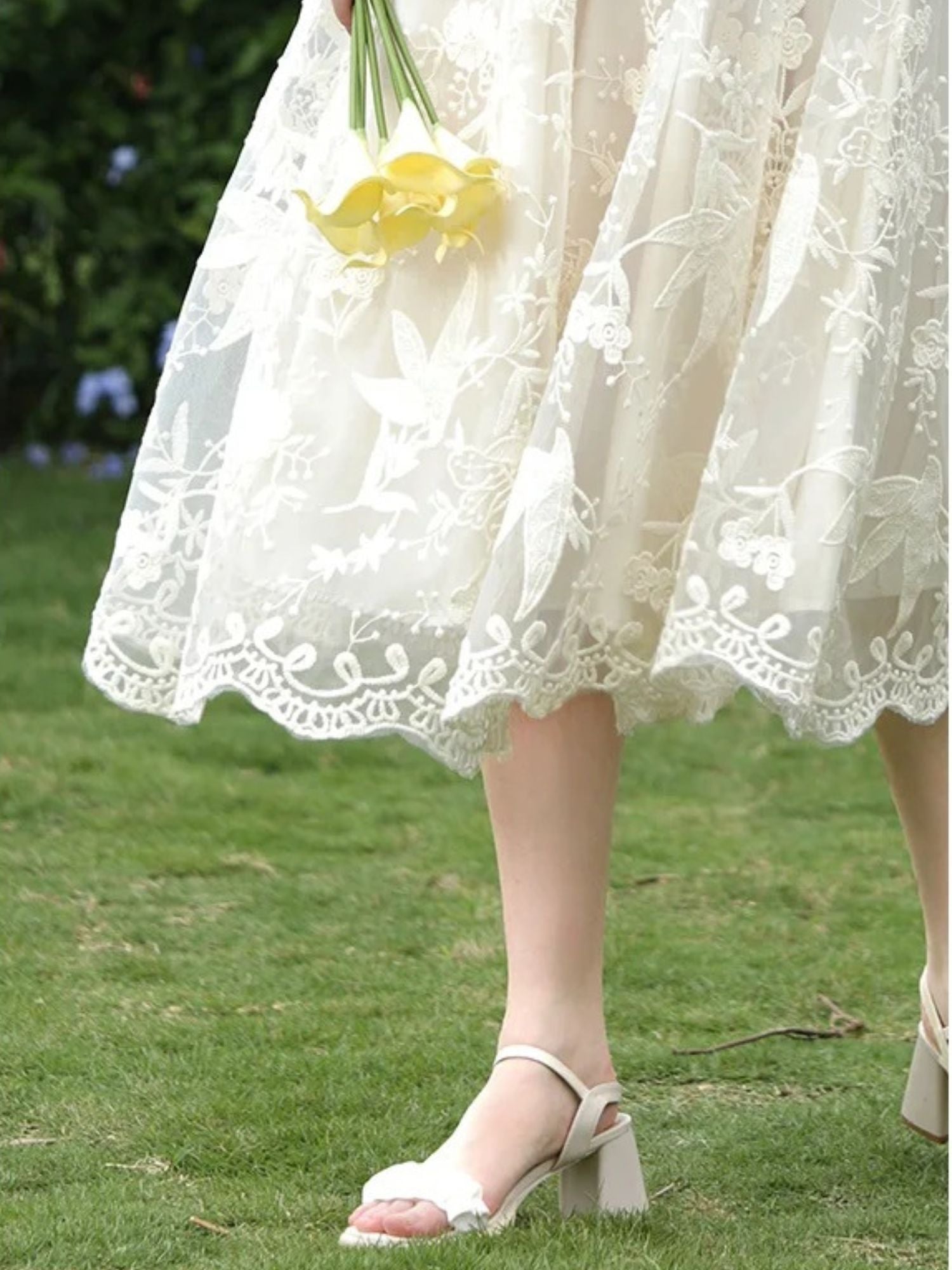 Close up of a lace midi skirt.